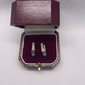 Stamped 14 K white gold earrings were genuine diamonds